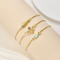 Bracciali regolabili personalizzati placcati oro 18K con catene a maglia, pavé di zirconi, design a forma di animali marini (scheletro di pesce, polpo e pesce) per donna