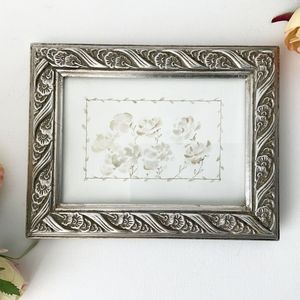 Contemporary metal <b>photo</b> <b>frame</b> designed to complement modern furniture while enhancing personal memory collections - Product Image 1