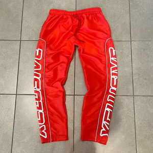 Streetwear personnalisé de haute qualité Pantalon de survêtement évasé en nylon Pantalon de survêtement à imprimé baggy pour hommes Pantalon coupe-vent réfléchissant - Product Image 5