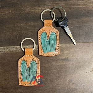 Porte-clés en cuir taillé sculpté à la main Porte-clés en cuir de forme exotique mignon Accessoires en cuir taillé Porte-clés mignons pour unisexe - Product Image 1