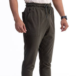 Pantalones Deportivos para Hombre de Alta Calidad con Logotipo Personalizado, Corte Ajustado Negro con Panel Lateral Blanco, Cintura Elástica y Bolsillos, Cómodos - Product Image 1