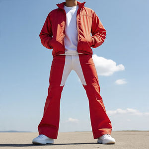 Ensemble pantalon évasé personnalisé pour hommes avec veste coupe-vent à fermeture éclair Ensemble de vêtements de sport légers pour le jogging ou le streetwear - Product Image 2