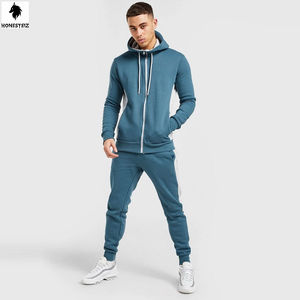 Baggy coupe-vent personnalisé 2 pièces pour femme Survêtement uni en nylon décontracté taille élastique devant plat motif en laine Service OEM - Product Image 1