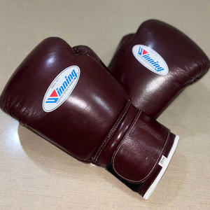 Guantes de boxeo ganadores de cuero profesional de marca ganadora personalizados Competencia de entrenamiento y combate con cordones Todos los tamaños y colores - Product Image 1