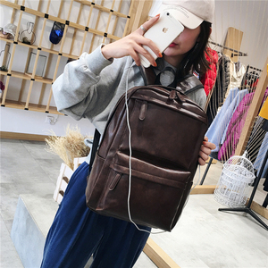 Slim leather laptop backpack for professionals with minimalist styling and padded interior sections - Product Image 3