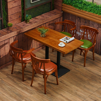 Chaise de salle à manger vintage en bois massif avec dossier en cuir et accoudoirs pour restaurant et café