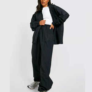 Chándal de nailon de color sólido para hombre, novedad, moda informal, ropa de dos piezas, transpirable y para invierno, venta al por mayor - Product Image 4