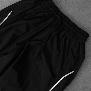 Pantalones de chándal de nailon holgados y casuales negros con botones laterales y rayas, joggers de nailon de poliéster para hombre - Product Image 6