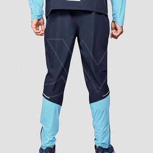 Chándal personalizado superior Chándales con logotipo reflectante personalizado de alta calidad Ropa deportiva para hombres Entrenamiento y trotar Chándal cortavientos - Product Image 4