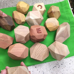 Tumi Ishi respetuoso con el medio ambiente, Roca de madera, juguetes de apilamiento, 99 DATOS dorados, Roca de madera Tumi Ishi - Product Image 1