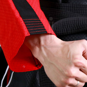 OEM Venta caliente de algodón de manga larga Taekwondo Uniforme Artes Marciales Uniforme de Taekwondo al por mayor - Product Image 6