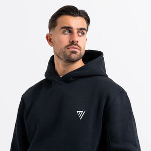 Vente en gros de sweats à capuche d'hiver personnalisés avec logo brodé, en coton noir, en molleton, surdimensionnés pour hommes par Marfa International - Product Image 3