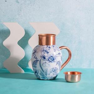 Jarra de agua de cobre con estampado floral azul y taza a juego para una hidratación ayurvédica elegante en el hogar - Product Image 1
