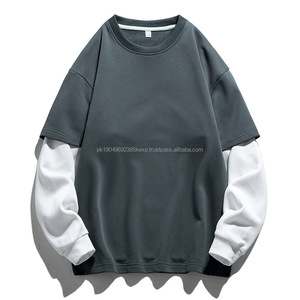 เสื้อสเวตเตอร์ผู้ชาย คอลเลคชั่นฤดูใบไม้ร่วง-ฤดูหนาว ปี 2024 แบบเรียบง่าย คอกลม แขนเสื้อต่อสีตัดกัน - Product Image 2