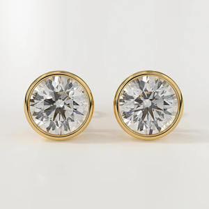 Bezel <b>Set</b> Moissanite <b>Stud</b> <b>Earrings</b> in Yellow Gold Modern Design Jewelry with Sleek Edges Ideal for Party or Daily Use - Product Image 2