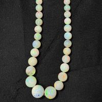 Perles d'opale naturelle éthiopienne lisses et rondes de 10 mm à 20 mm, de haute qualité, couleur arc-en-ciel, pour la fabrication de bijoux, plus de 50 ans d'expérience