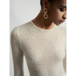 เสื้อคอกลมผ้าขนแกะสไตล์หรูหราสำหรับผู้หญิงผ้าแจ็คการ์ดลายลูกไม้สีขาวเป็นมิตรต่อสิ่งแวดล้อมสำหรับฤดูหนาวของผู้หญิง - Product Image 1