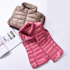 Veste d'hiver chaude à demi-manches Veste matelassée pour femmes OEM Tissu à bulles Veste matelassée sans manches coupe-vent - Product Image 1