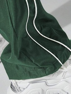 Pantalones de chándal informales con cintura elástica para hombre, pantalones de pierna ajustables con cordón de rayas laterales, tela holgada - Product Image 3