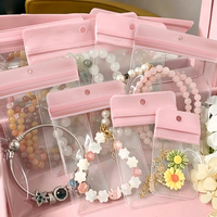Sachets Ziplock en EVA rose avec trou de suspension, prêts à l'emploi, réutilisables et auto-scellants pour le rangement des boucles d'oreilles, colliers et bagues