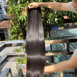 Paquetes negros de color natural de cabello humano vietnamita de alta calidad de grado 12A con precio al por mayor - Product Image 1