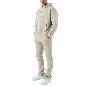 Ensemble de survêtements évasés à impression bouffante 3D avec logo personnalisé pour hommes Pantalon de survêtement évasé à ourlet brut 100% coton et sweat à capuche Vêtements de sport lourds - Product Image 1