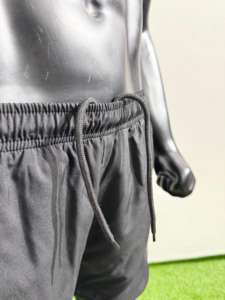 Pantalones cortos deportivos hechos a medida de poliéster 100% con cierre de cordón y logotipo impreso - Product Image 3