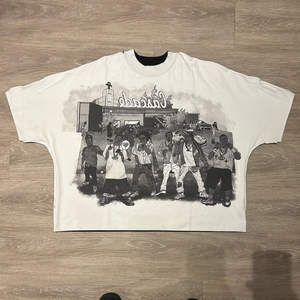 เสื้อยืดบ็อกซี่ลำลองสไตล์วินเทจของผู้ชายผ้าคอตตอน100% โลโก้โอเวอร์ไซส์ออกแบบได้ตามต้องการ - Product Image 1