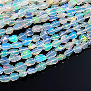 Perles de pépites d'opale éthiopienne naturelle de forme ovale lisse blanche pour la fabrication de bijoux à la mode perles de pierres précieuses - Product Image 4