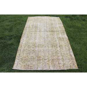 Vintage Area Rug 4x6.7 ft (121x204 cm), Turkish <b>Yellow</b> Animal Print <b>Wool</b> Rug - Product Image 1