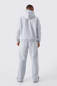 Ensemble de survêtement streetwear personnalisé délavé à l'acide avec sweat à capuche zippé et pantalon évasé effet vieilli et patchs - Product Image 4