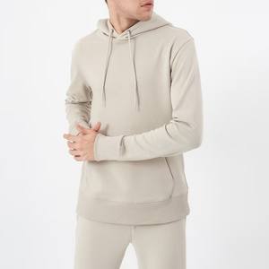 Stylish <b>Longline</b> <b>Hoodie</b> with Extended Back Hem Split Sides Tonal Logo Print and Ribbed Thumb Cuff Sleeves for Cozy Fit - Product Image 1