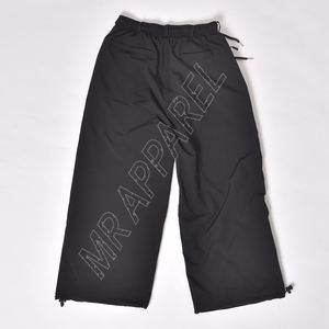Pantalones de nieve impermeables holgados negros con cordón en D en la cintura con forro polar cálido y parte inferior Cinch para ropa de invierno - Product Image 2