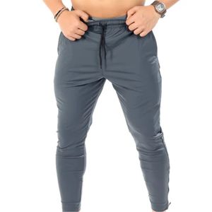 กางเกงจ็อกเกอร์แบบผูกเชือกเอวสูงแห้งเร็วระบายอากาศได้ดีสำหรับผู้ชายฤดูใบไม้ร่วง - Product Image 5