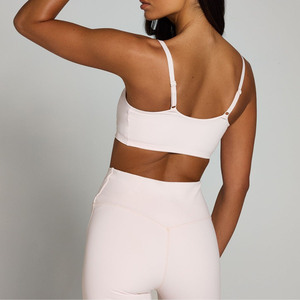 Sujetador deportivo de yoga de alta sujeción personalizado para mujer con almohadillas extraíbles, logo frontal, top corto transpirable para entrenamiento, venta al por mayor. - Product Image 5