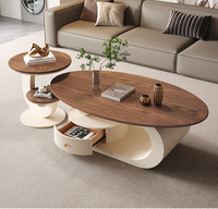 Table basse créative de style crème, ovale, pour petit appartement, style italien minimaliste, plateau en roche, table à thé