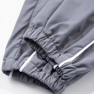 Survêtement rétro pour homme, idéal pour un style décontracté et streetwear, avec tissu respirant et coupe confortable pour l'été. - Product Image 4