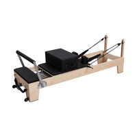 Machine de Pilates Reformer avec un cadre en érable d'Amérique du Nord solide et des ressorts allemands pour l'entraînement professionnel en studio