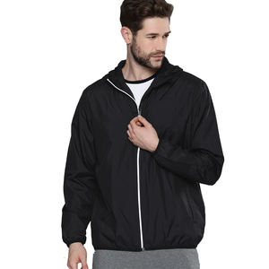 Chaqueta cortavientos de diseño personalizado de alto rendimiento de tendencia superior para hombres y mujeres, abrigo de invierno impermeable con posición de logotipo frontal - Product Image 1