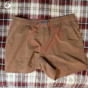 Short coupe-vent d'été décontracté pour hommes en polyester avec taille élastique et poches de couleur unie orange pour un usage quotidien - Product Image 2