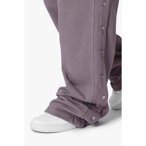 Pantalon en molleton de coton surdimensionné avec cordon de serrage contrastant et poches à rabat latérales - Product Image 1