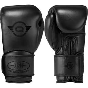 Guantes de entrenamiento de boxeo de cuero genuino Muay Thai Fighting Cómodo Guante de combate ligero, logotipo personalizado Color y diseño OEM