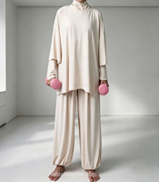 Ensemble de sport modeste 2 pièces OEM personnalisé pour femmes musulmanes : Tunique à col montant superposée avec cape et pantalon sarouel à jambes larges