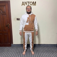 Ensemble de survêtement décontracté pour homme, style nouveau, en tissu épais, avec sweat à capuche à cordon et pantalon de jogging, deux pièces