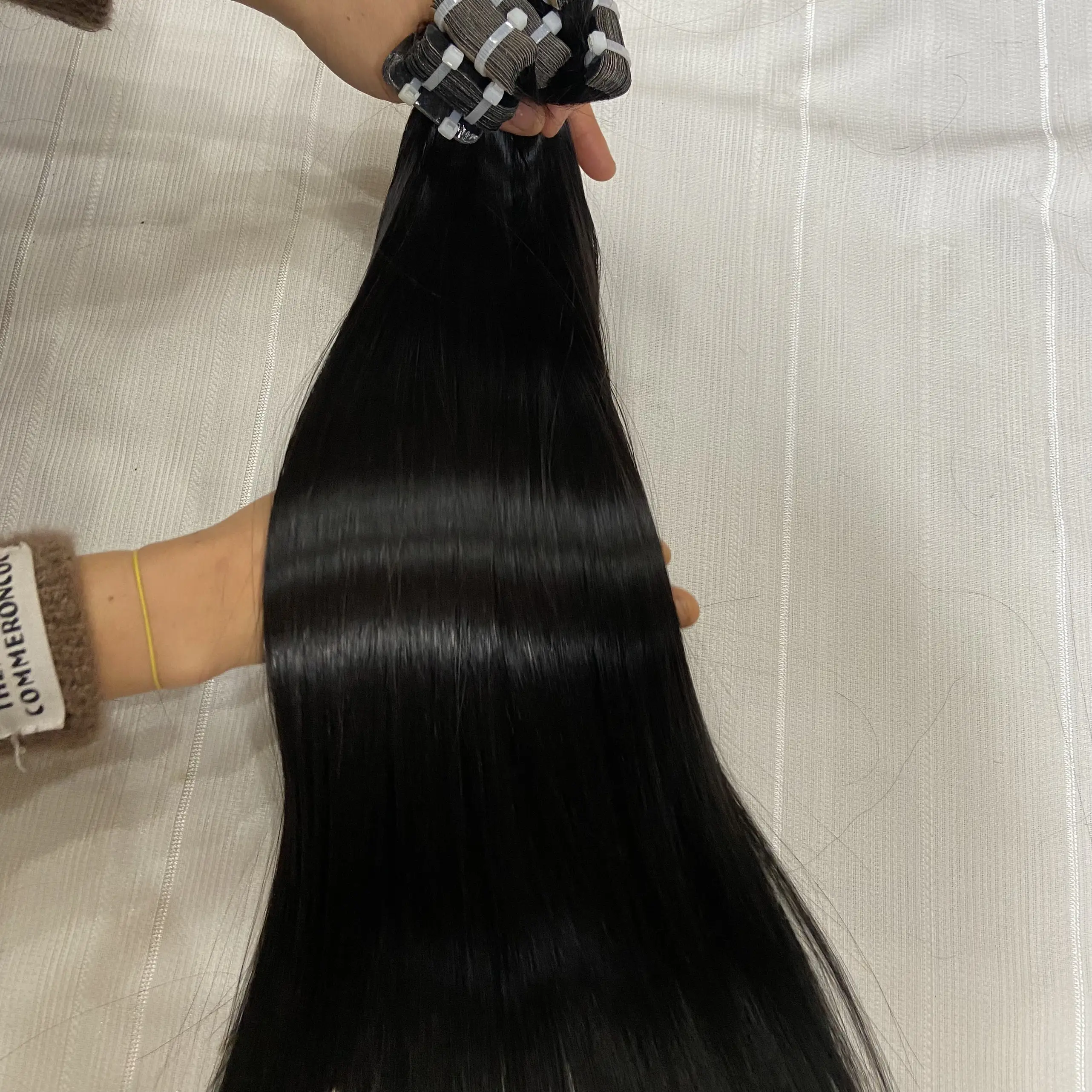 Hot style tape in hair extensions ssd bone straight tape ins extensions human hair made by raw vietnamese human hair soft