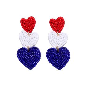 ต่างหูรูปหัวใจประดับลูกปัดสีทองสีแดงสีขาวและสีฟ้าทำด้วยมือเครื่องประดับที่ได้แรงบันดาลใจจากธงสหรัฐอเมริกาสำหรับผู้หญิง - Product Image 1
