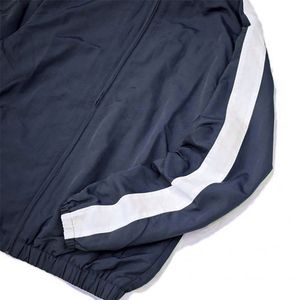 Moda OEM logotipo personalizado hombres Casual Jogger conjunto de dos piezas de nailon poliéster hombre cargo rompevientos chándal para niños - Product Image 2