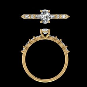 Impresionante Anillo de Compromiso de Oro Amarillo de 14K/18K con Diamante Ovalado de 0.74 Quilates y Banda Alternante con Corte Marquise y Redondo, Elegante Joyería Nupcial - Product Image 3