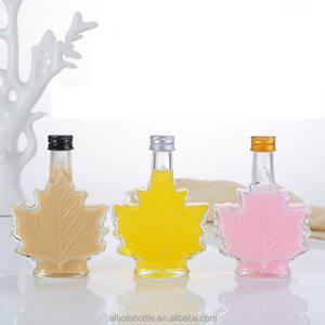 Bouteilles en verre uniques en forme de feuille d'<span class=keywords><strong>érable</strong></span> 50ml 100ml 250ml pour <span class=keywords><strong>l</strong></span>'emballage des boissons <span class=keywords><strong>Rhum</strong></span> foncé Whisky Miel Eau Bouchon <span class=keywords><strong>à</strong></span> vis - Product Image 5