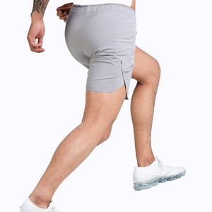 กางเกงขาสั้นบาสเก็ตบอลวิ่งออกกำลังกายสำหรับผู้ชายผ้าโพลีเอสเตอร์แห้งเร็วระบายอากาศได้ดีผ้า100% ปรับแต่งโลโก้ได้ตามต้องการ - Product Image 3